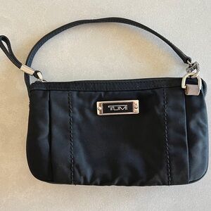 Tumi Voyageur Vienna black nylon/leather wristlet.